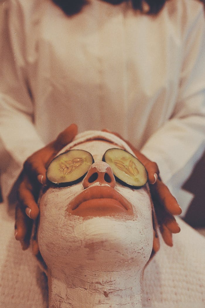 A soothing spa facial with a cucumber mask for rejuvenation and relaxation.